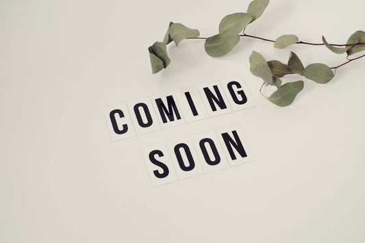 Coming soon sign with green leaves, promoting Retinol Renewal Facial Serum.